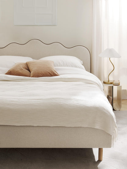Romvaila Upholstered Bed with Wavy Headboard